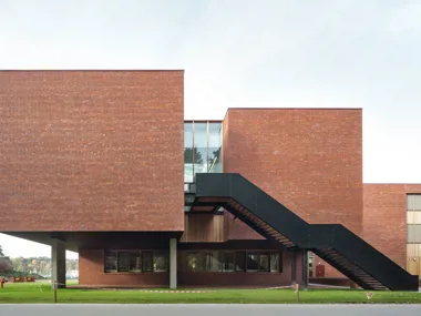 Red brick at one with the surrounding nature