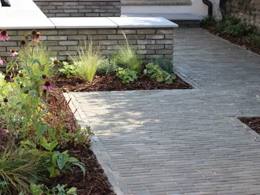 back garden with a subtle mix of traditional materials