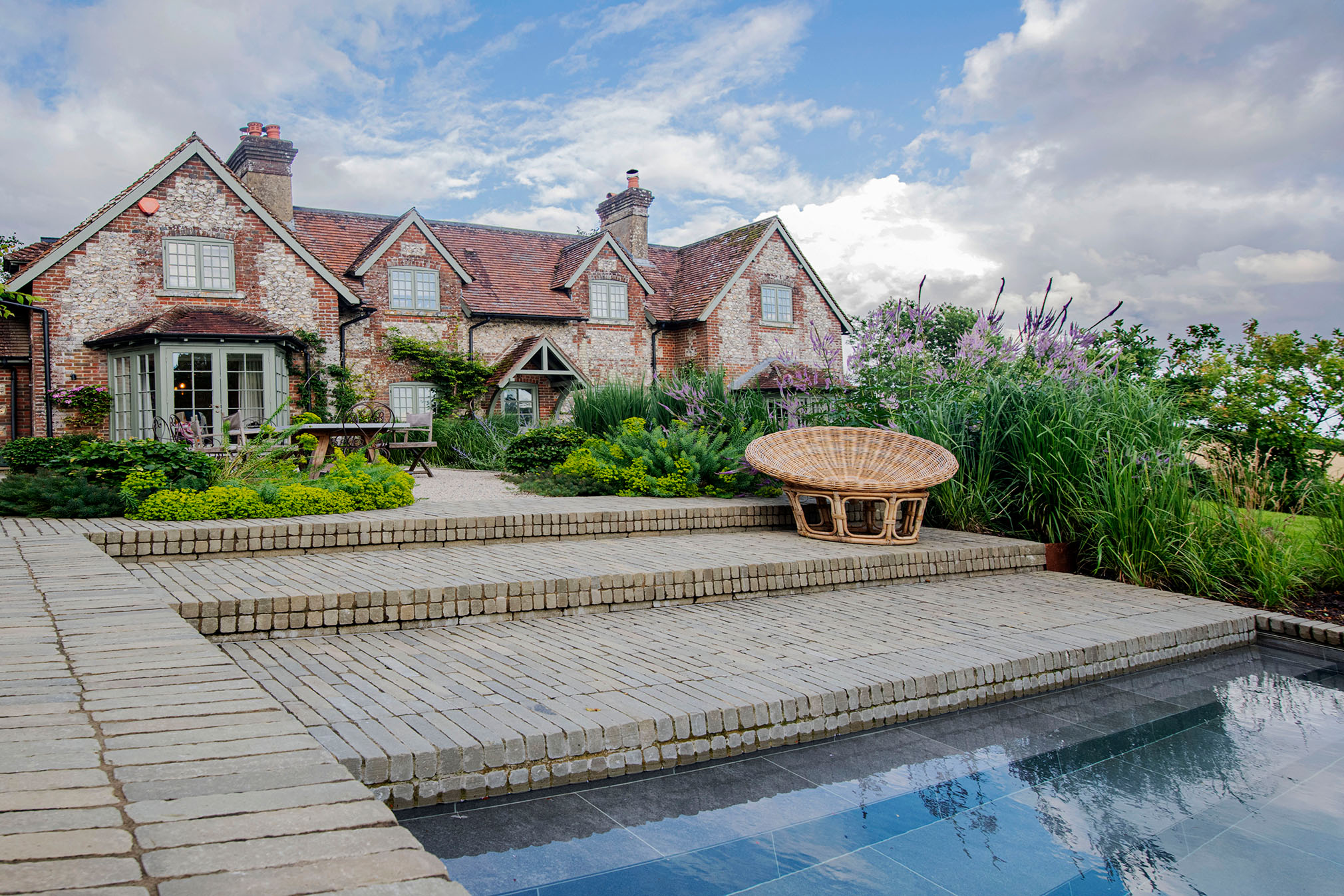 SeptimA Olive clay pavers give the terrace and pool area the desired texture